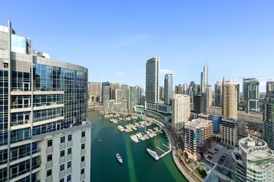 a view of a river in a city with buildings at Impressive View 2BR in Dubai Marina Walk2Beach in Dubai
