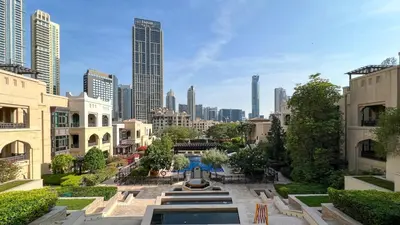 a view of a city skyline with tall buildings at Luxurious Unique 2 Bed with Private Jacuzzi & Garden - Connected to Souk Al Bahar - Dubai Mall in Dubai