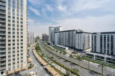 an aerial view of a city with tall buildings at GuestReady - Chic accents in Dubai Hills in Dubai