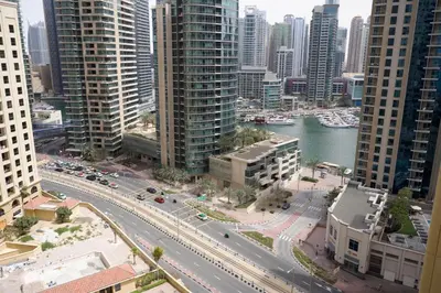 an aerial view of a city with tall buildings at Charming spacious studio apartment in the heart of JBR By SWEET HOMES in Dubai