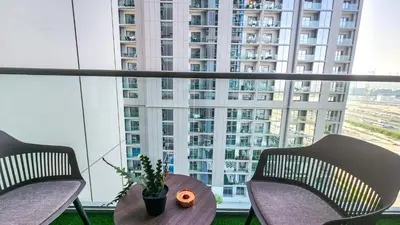 a table with a potted plant sitting on top of a window at STAY BY LATINEM Luxury 1BR Holiday Home CV B905 near Burj Khalifa in Dubai