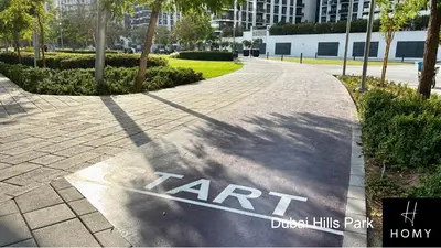 a sidewalk with the word art painted on it at Enjoy a Modern and Trendy apartment in the Heart of Dubai in Dubai