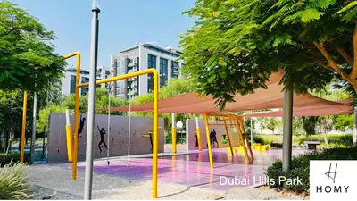 a bus stop with a canopy in a park at Enjoy a Modern and Trendy apartment in the Heart of Dubai in Dubai