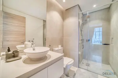 a bathroom with a toilet sink and a shower at Peaceful 1BR in Studio One Dubai Marina by Deluxe Holiday Homes in Dubai