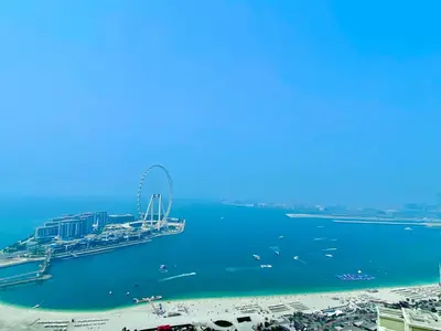 an aerial view of a beach with a ferris wheel at JBR Beach - Panoramic Sea View 2BR Apartment in Dubai