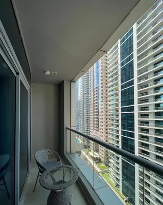 a balcony with a view of a city skyline at 1 bedroom in Torch Tower Dubai Marina in Dubai