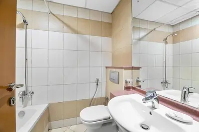 a bathroom with a toilet and a sink at StoneTree - Marina Diamond Studio - Near Metro Station in Dubai