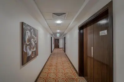 a hallway with a hallwayngthngthngthngthngthngthngthngthngthngthngth at Icon Delux Hotel Apartments Al Barsha - Formerly Abidos in Dubai