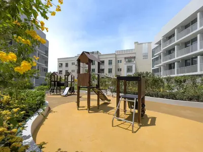 a playground in the middle of a building at Very Cozy & Relaxing Studio in JVC in Dubai