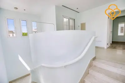 a large white room with an orange object on the wall at Keysplease Amazing 2 B/R Villa With private Pool, JVT in Dubai