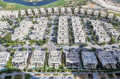 an aerial view of a large apartment complex at Full Golf View Studio in Damac Hills - Host & Stay in Dubai