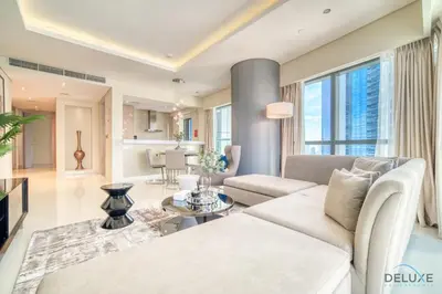 a living room with a couch and a table at Sophisticated 2BR at DAMAC Towers by Paramount A Business Bay by Deluxe Holiday Homes in Dubai