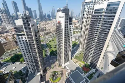 an aerial view of a city with tall buildings at Romantic hideaway w breathtaking Burj Khalifa view in Dubai