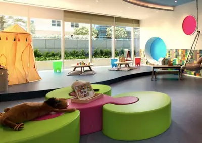 a room with a toy dog laying on a table at StoneTree - DAMAC Heights 1 BR - Amazing Facilities in Dubai