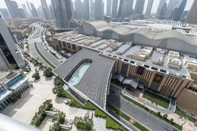 an aerial view of a building in a city at New Listing - Serviced Apartment & TOP Amenities in Dubai